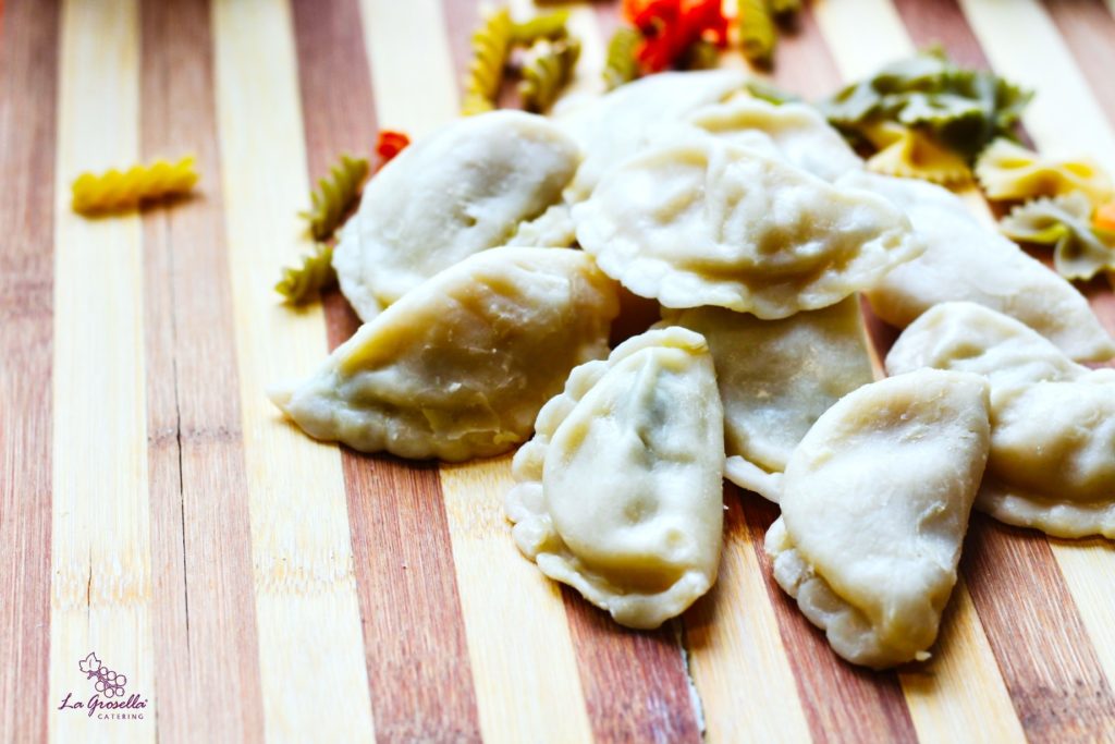 Raviolis rellenos de patata y boletus con mantequilla