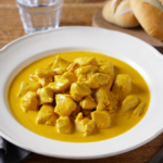 Comida a domicilio - Ragú de pollo al curry amarillo y leche de coco