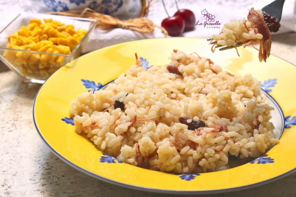 Arroz con confit de pato y pasas