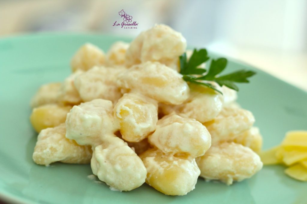 Ñoquis a la parmesana