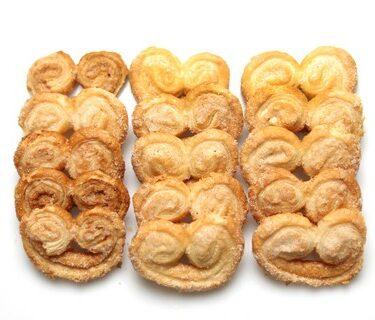 Typical sweet cookies from Argentina called palmeritas. Shot taken on a white background