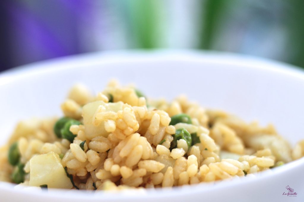 Arroz con sepia y guisantes