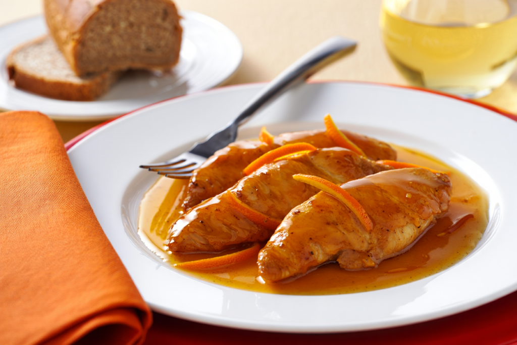 Solomillos de pollo con salsa de naranja y cerveza